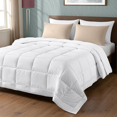 Queen‑size Beddora comforter displayed flat to show lightweight, machine‑washable cotton fabric and classic bedding style.