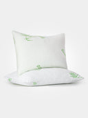Beddora Bamboo Pillow in white with breathable bamboo viscose cover and shredded memory foam for cooling comfort and support.