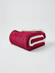 Detail shot of plush sherpa fleece fibers on Beddora throw blanket for winter comfort.